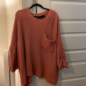 Fab’rik knit sweater with pocket and hemmed sleeve detail